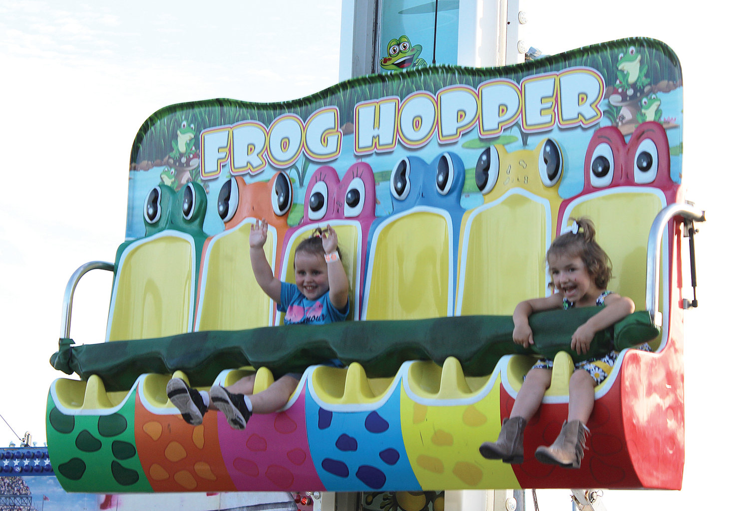 Adeline Riley, of Willow Springs, and Audrey Kicklighter, of Mountain Grove, enjoy the Frog Hopper.